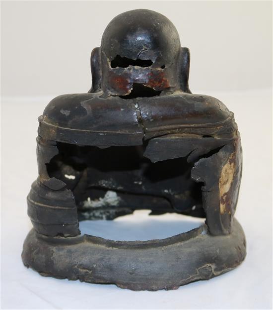 A Chinese gilt lacquered bronze seated figure of Budai, late Ming dynasty, 17cm, damage